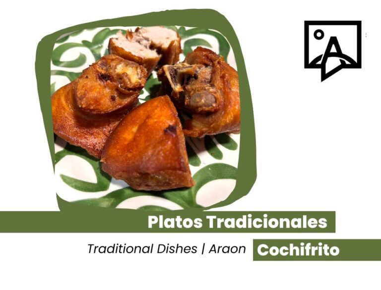 Platos tradicionales: Piezas de cochifrito fritas en un plato verde y blanco